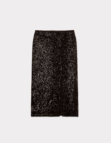 Jupe portefeuille en sequin - noir - celio - Modalova