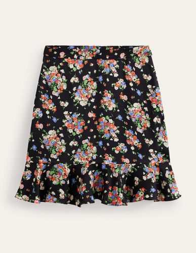 Mini-jupe florale à volants en satin - Boden - Modalova