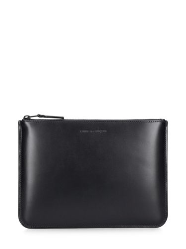 Pochette En Cuir Very Black - COMME DES GARÇONS WALLET - Modalova