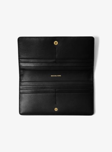 MK Grand portefeuille Bryant en cuir grainé avec bouton-pression sur le devant - Michael Kors - MICHAEL Michael Kors - Modalova