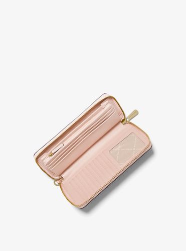 MK Grande pochette à sangle Jet Set Travel en cuir grainé - Michael Kors - Michael Kors Outlet - Modalova