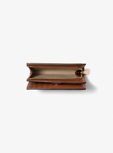MK Portefeuille Bryant de taille moyenne en cuir grainé - Michael Kors - MICHAEL Michael Kors - Modalova