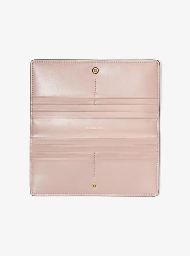 MK Grand portefeuille Bryant en cuir grainé avec bouton-pression sur le devant - Michael Kors - MICHAEL Michael Kors - Modalova