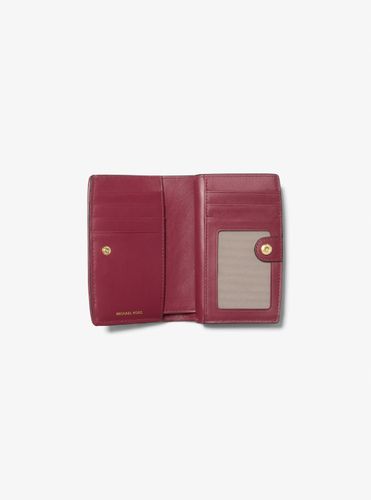 MK Portefeuille Bryant de taille moyenne en jacquard à logo - Michael Kors - MICHAEL Michael Kors - Modalova