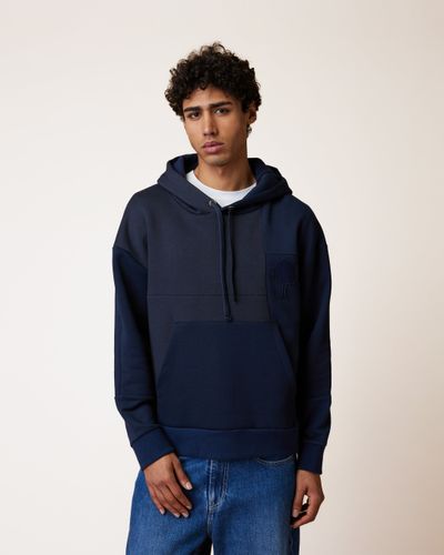 Sweat à capuche bleu marine - FAGUO - Modalova