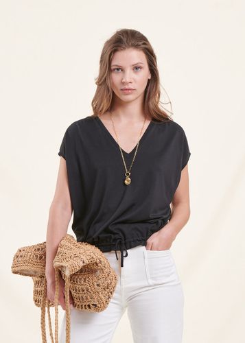 T-shirt blousant noir en lyocell manches courtes - La Fée Maraboutée - Modalova
