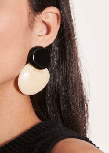 Boucles d'oreilles en résine et blanc - La Fée Maraboutée - Modalova