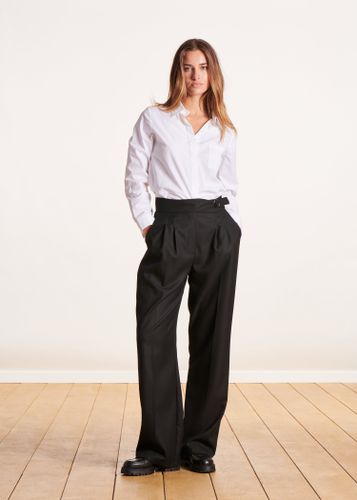 Pantalon noir large ceinture fantaisie - La Fée Maraboutée - Modalova