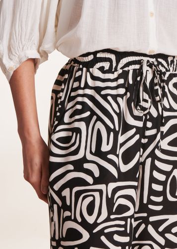 Pantalon fluide à imprimé taille élastique - La Fée Maraboutée - Modalova