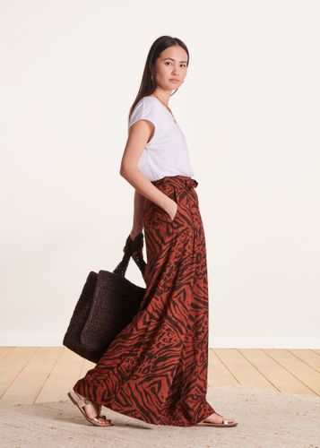 Pantalon large marron à imprimé animalier - La Fée Maraboutée - Modalova