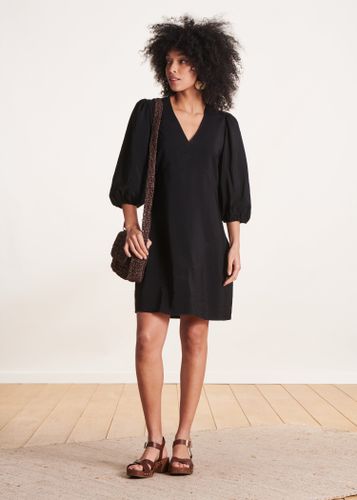 Robe courte cintrée à manches longues - La Fée Maraboutée - Modalova