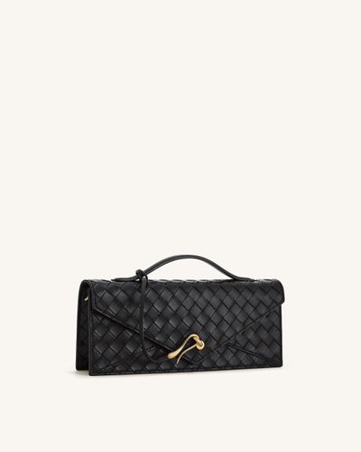 Celeste Sac à main enveloppe à anse supérieure, à texture tissée - Noir - JW PEI - Modalova
