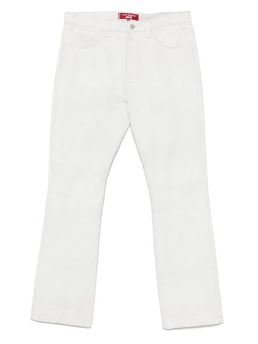 Jeans With Logo Application - Junya Watanabe - Modalova