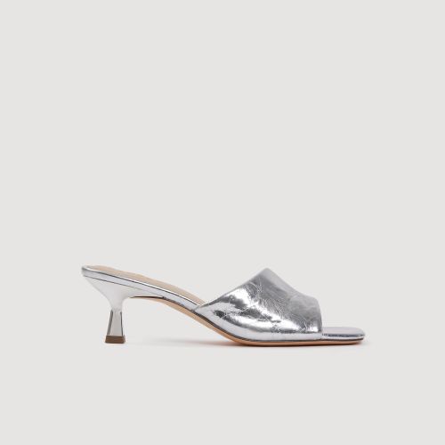 Mules à talon en cuir métallisé - Sandro Paris - Modalova