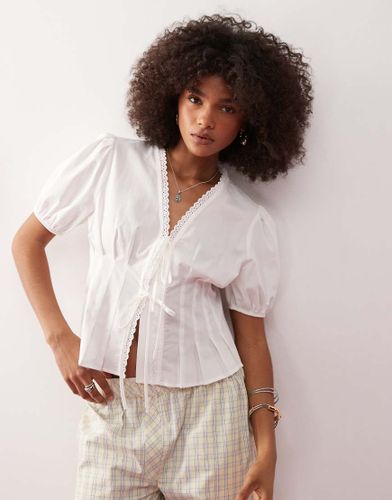 Top nou devant  manches bouffantes et taille cintre - Collusion - Modalova