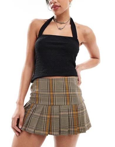 Ultimate - Mini jupe-short plissée coupe ajustée à carreaux - Marron - Collusion - Modalova