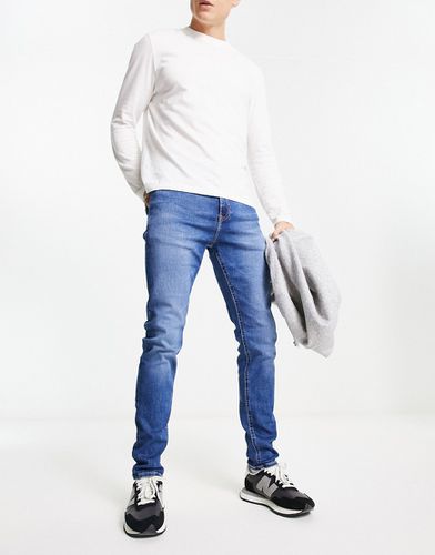 Jean skinny à délavage moyen - Calvin Klein Jeans - Modalova