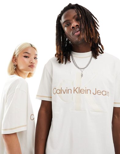 T-shirt unisexe à logo monogramme - Ivoire - Calvin Klein Jeans - Modalova