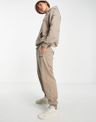 Trefoil Linear - Jogger de qualité supérieure avec écusson sur la jambe - craie - adidas Originals - Modalova