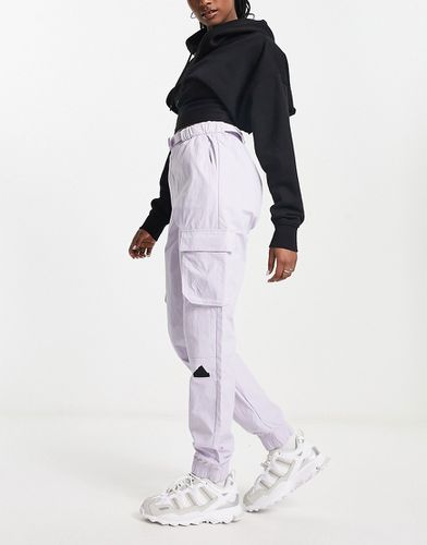 Adidas Sportswear - Future Lounge - Pantalon cargo à logo caoutchouté - Adidas Performance - Modalova