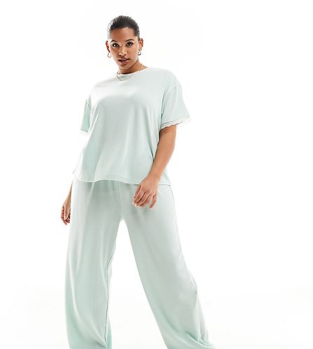ASOS DESIGN Curve - Exclusivité - Ensemble de pyjama avec t-shirt et legging en tissu gaufré orné de dentelle - Asos Curve - Modalova
