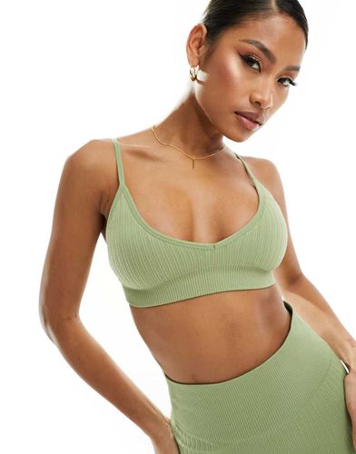 Brassière de sport côtelée sans coutures maintien léger avec rembourrage amovible - Pistache - Asos 4505 - Modalova