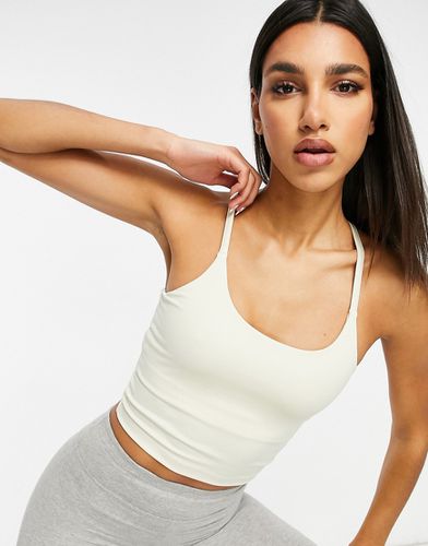 Icon - Crop top de yoga style caraco avec soutien-gorge intérieur - Asos 4505 - Modalova