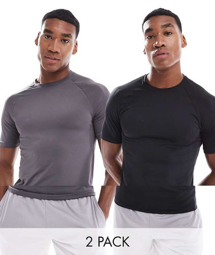 Icon - Lot de 2 t-shirts d'entraînement moulant à séchage rapide - Noir et anthracite - Asos 4505 - Modalova