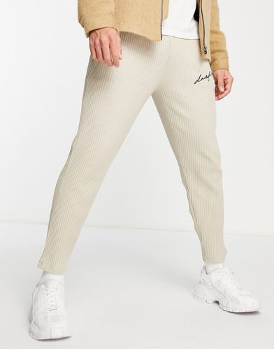 ASOS - Dark Future - Pantalon de jogging décontracté en côtes épaisses avec logo brodé - Neutre - Asos Design - Modalova
