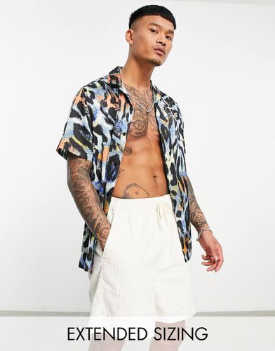 Chemise décontractée à revers en satin imprimé animal - Asos Design - Modalova