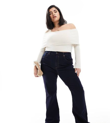 ASOS DESIGN Curve - Jean évasé et sculptant en tissu power stretch - foncé - Asos Curve - Modalova