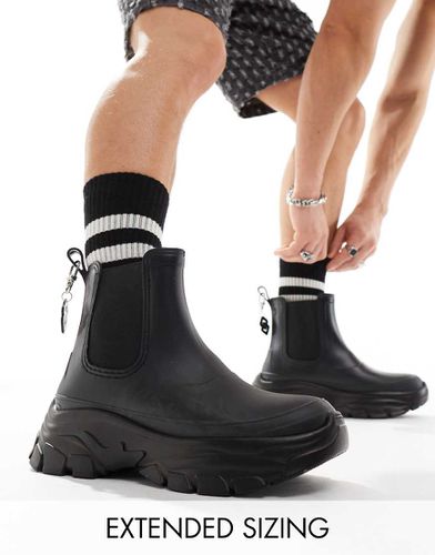 Bottes en caoutchouc chunky avec détail chaîne à l'arrière - Asos Design - Modalova