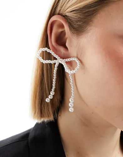 Boucles d'oreilles avec naud de perles fantaisie - Asos Design - Modalova