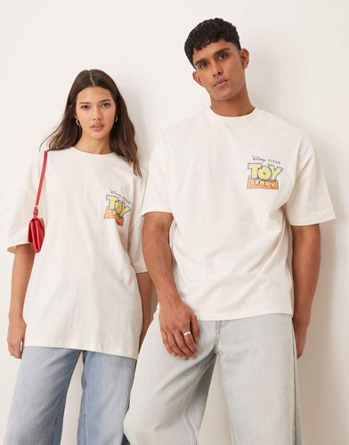 Disney Pixar - T-shirt oversize unisexe avec imprimés Toy Story façon esquisses - Beige - Asos Design - Modalova