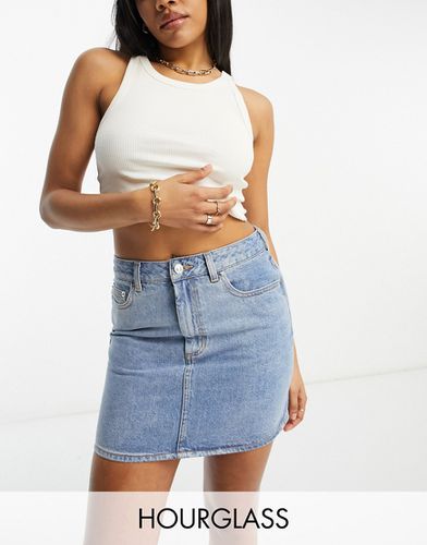 Hourglass - Mini-jupe en jean à taille haute - délavé moyen - Asos Design - Modalova