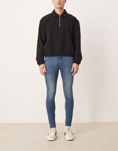 Jean seconde peau - foncé délavé - Asos Design - Modalova