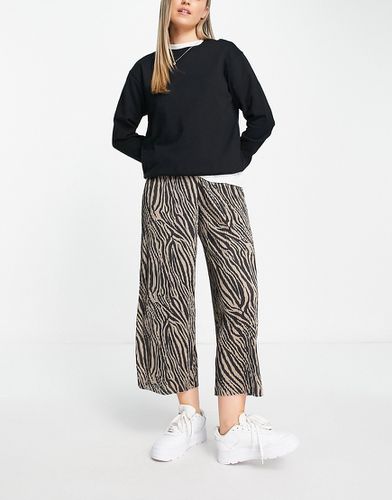 Jupe-culotte ample et plissée à imprimé animal - Asos Design - Modalova