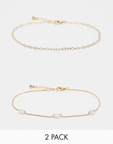 Lot de 2 bracelets de cheville avec fleurs ornées de perles fantaisie - Asos Design - Modalova