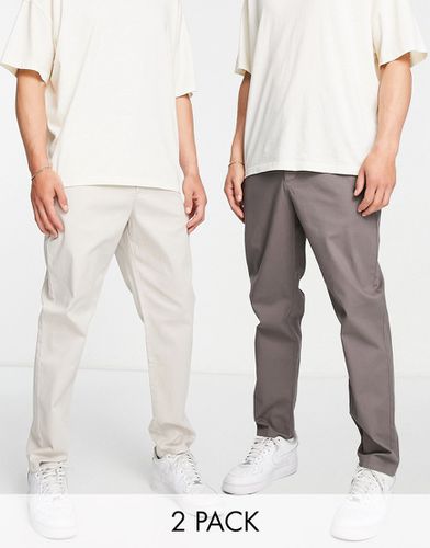 Lot de 2 pantalons chino fuselés - Anthracite et gris clair - Économie - Asos Design - Modalova