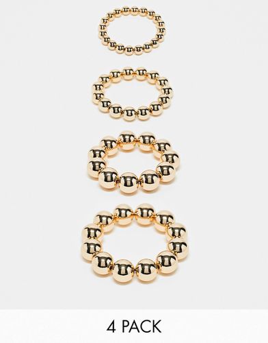 Lot de 4 bracelets ornés de boules - Asos Design - Modalova