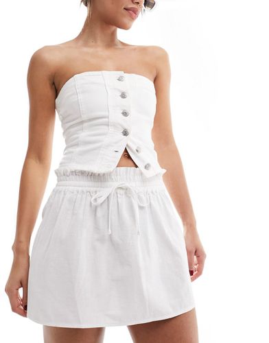 Mini-jupe nouée à la taille en aspect lin - Asos Design - Modalova