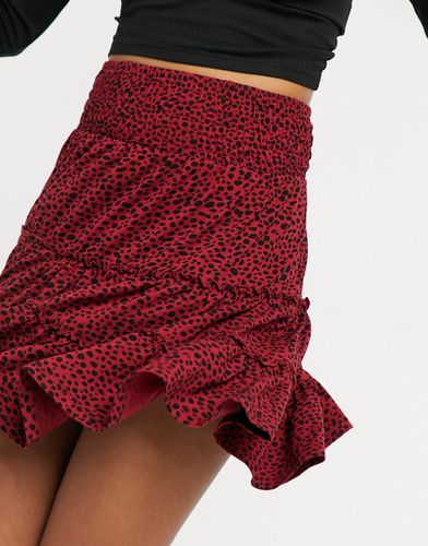 Mini-jupe à volants étagés et imprimé animal - Rouge et noir - Asos Design - Modalova