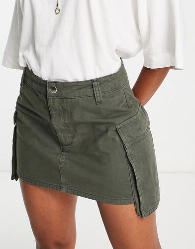 Mini-jupe avec poches à soufflet - Kaki - Asos Design - Modalova