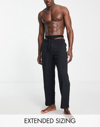 Pantalon confort en jersey à lanières - Asos Design - Modalova