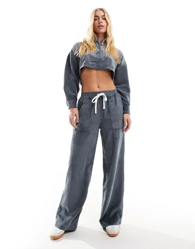 Pantalon cargo ample à enfiler en velours côtelé - Asos Design - Modalova