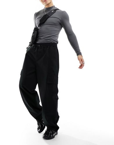 Pantalon cargo ample avec taille élastique - Asos Design - Modalova