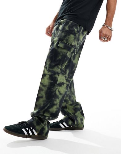 Pantalon cargo ample et élégant - Kaki camouflage - Asos Design - Modalova