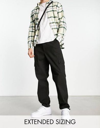 Pantalon cargo fuselé à cordons de serrage - Asos Design - Modalova