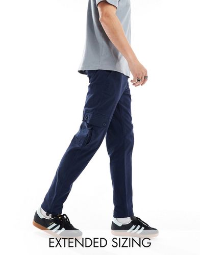 Pantalon cargo fuselé - marine - Asos Design - Modalova