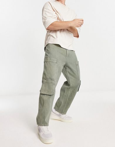 Pantalon cargo oversize fuselé - délavé - Asos Design - Modalova